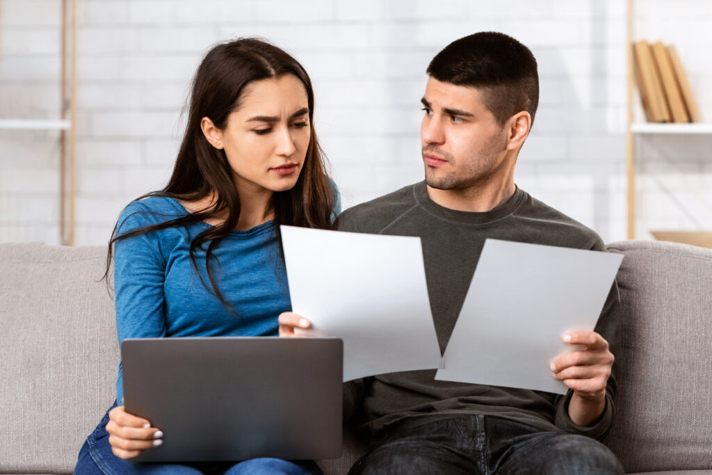 couple having financial problems, managing family budget