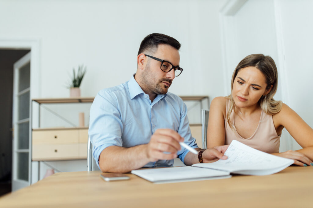 two serious business people working together, portrait.
